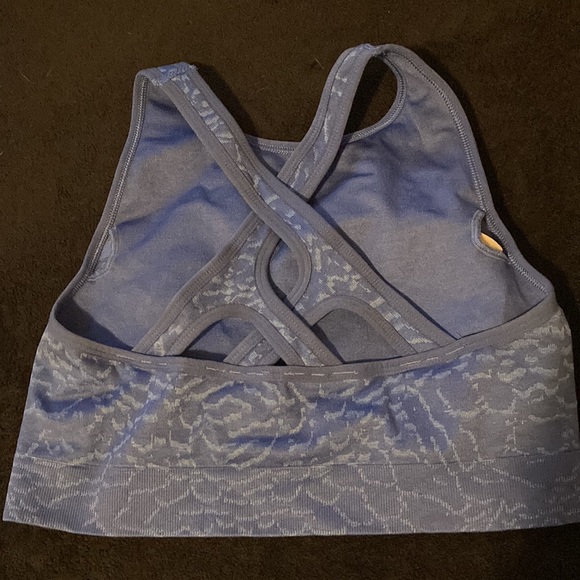 A Gymshark sports bra size large but runs small. - Picture 2 of 2